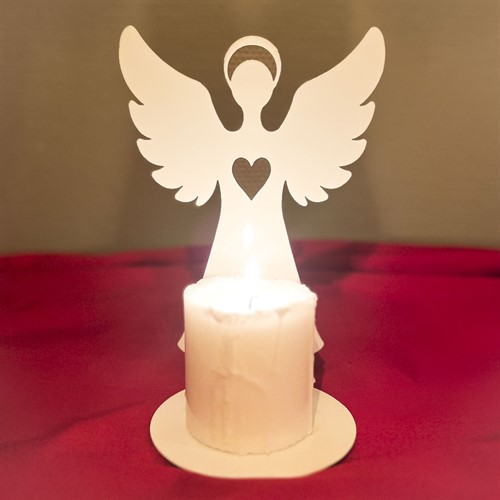 Blockljus framför ängel